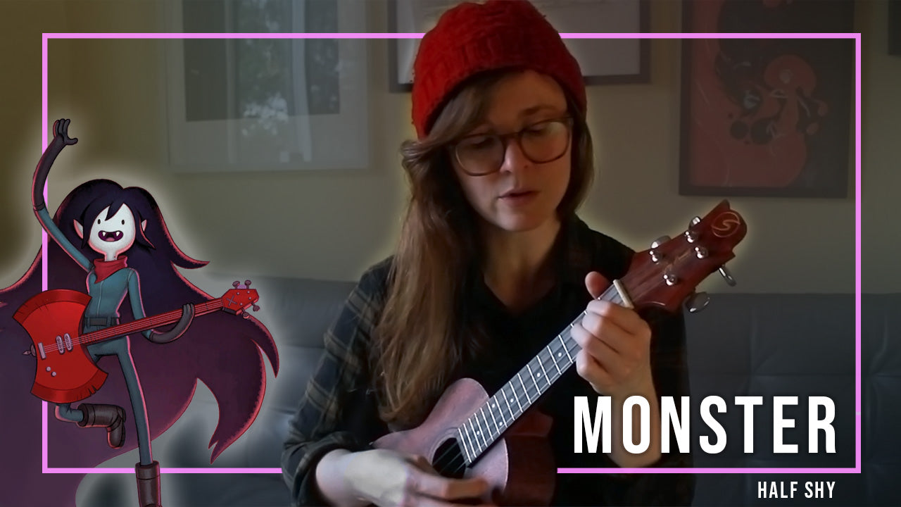 Marceline from Adventure Time shown with Half Shy playing the Ukulele